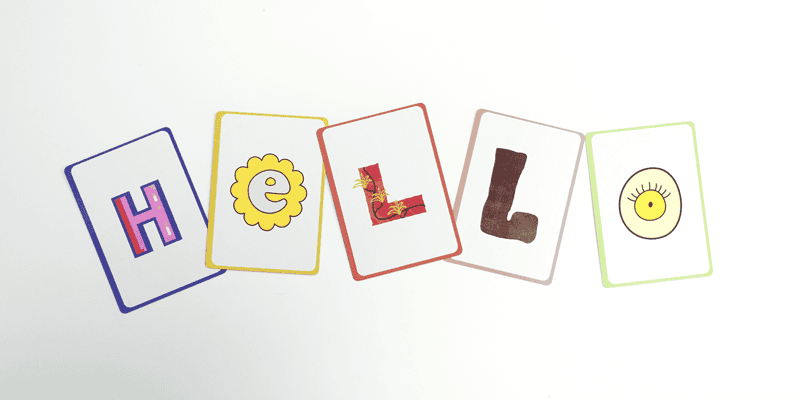 5 custom printed plaing cards each with one letter design and in total spelling the word hello