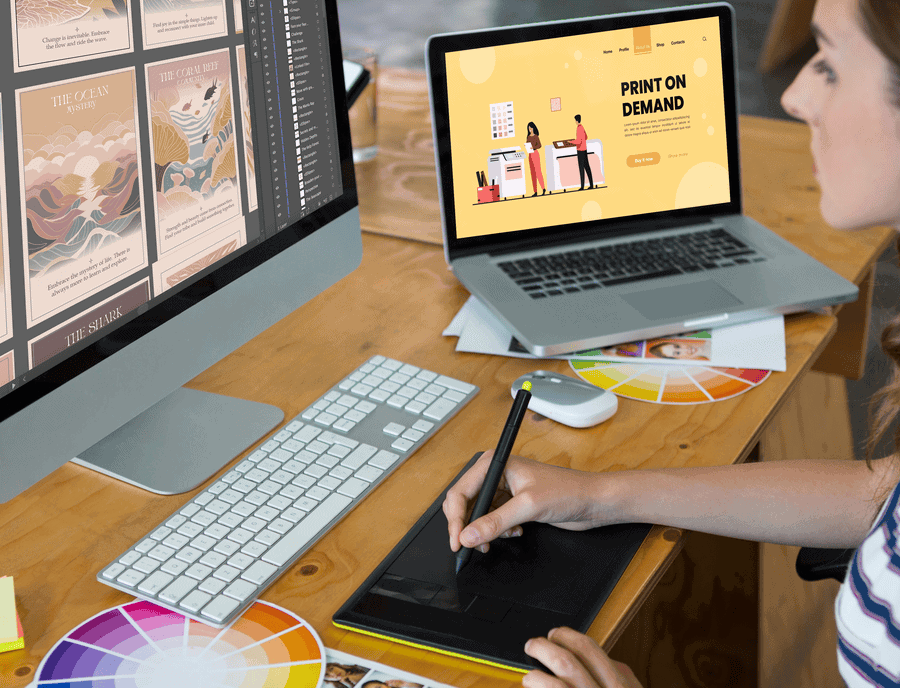 women designing on computer with print on demand text on her laptop