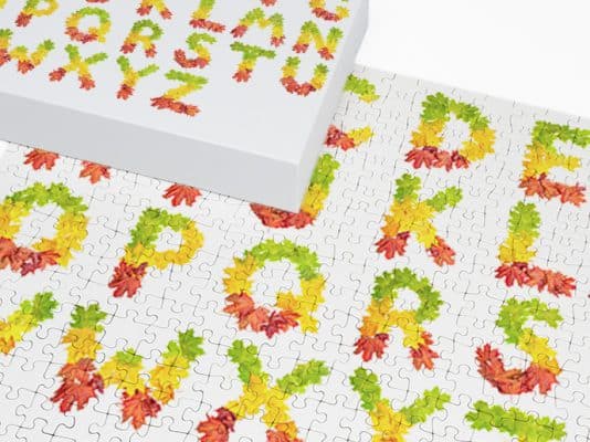 alphabet letters on a jigsaw puzzle for children