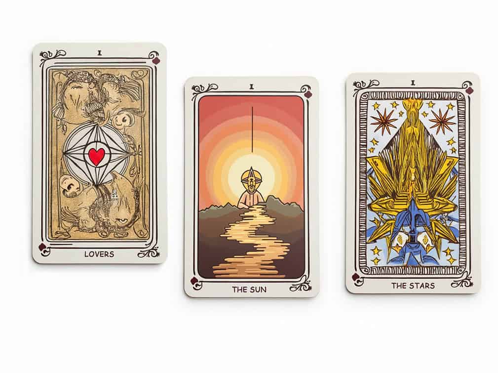 three different tarot cards