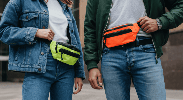man and women with fanny packs