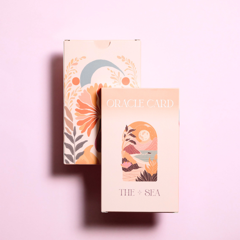 A high-quality custom printed tuck box for a tarot card deck.