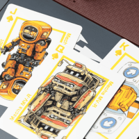 several custom playing cards stacked together with unique robot like designs on them